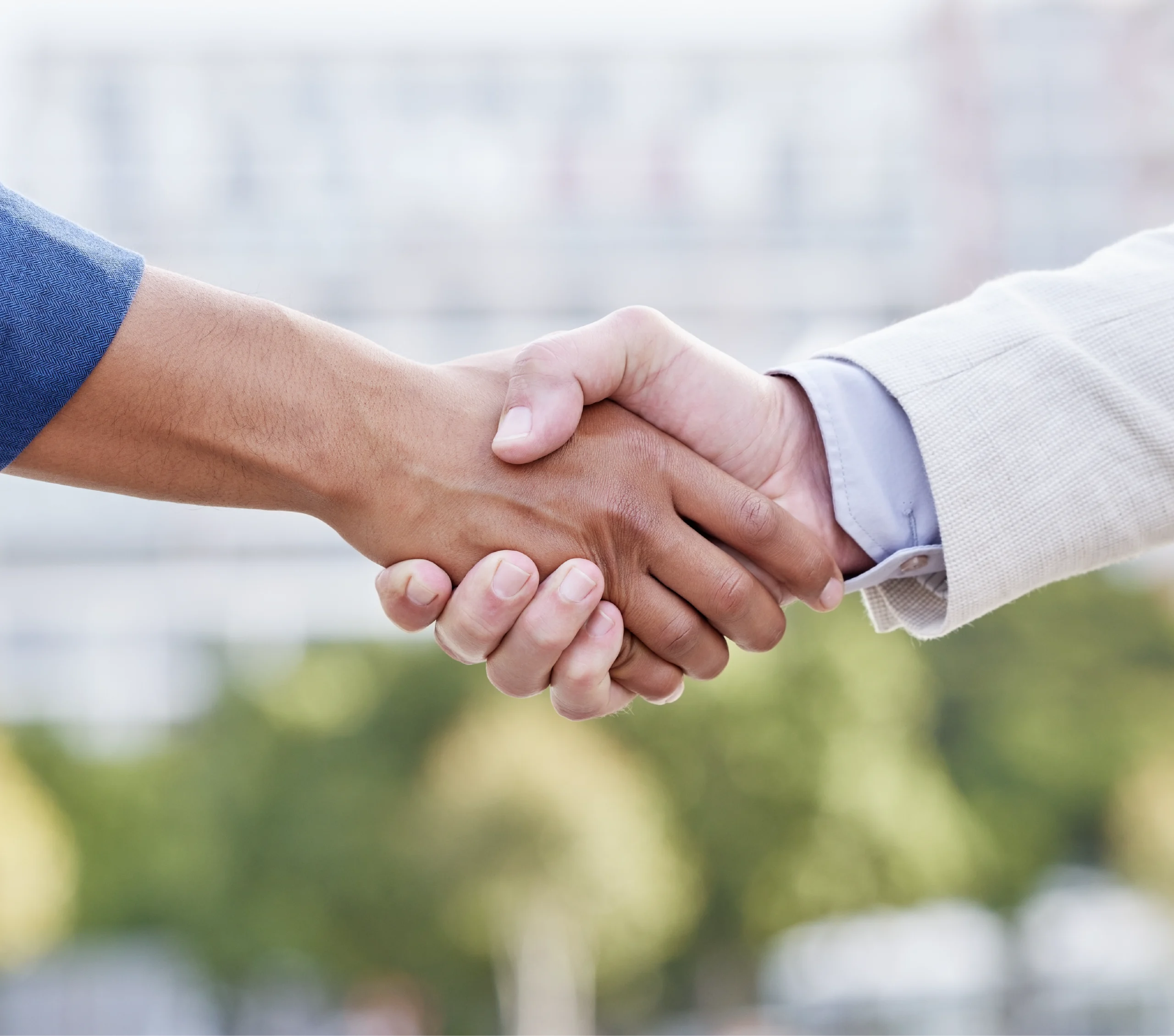 Hands shaking, business deal. Men shaking hands.